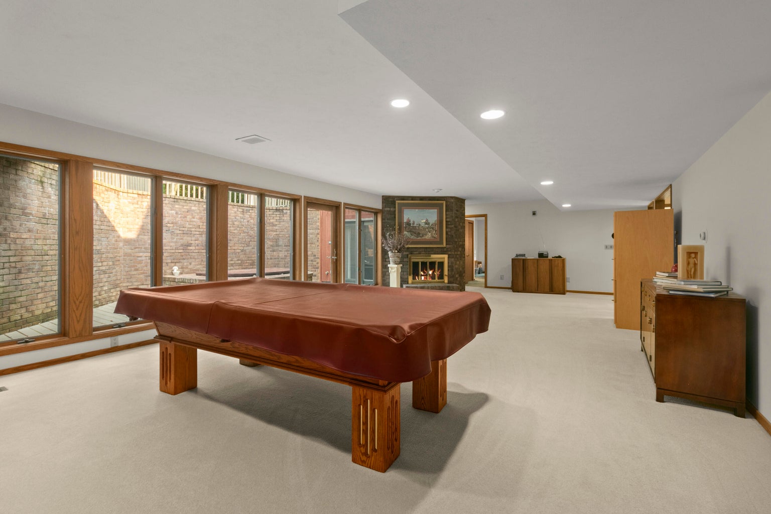 20260812184410630557000000-o large room with windows and pool table