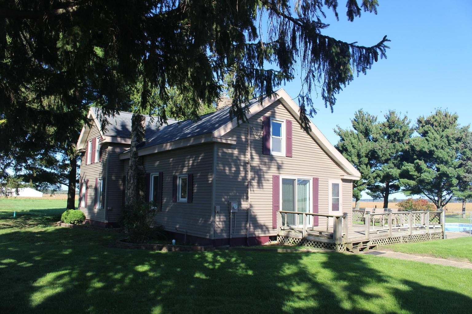 home shaded by trees