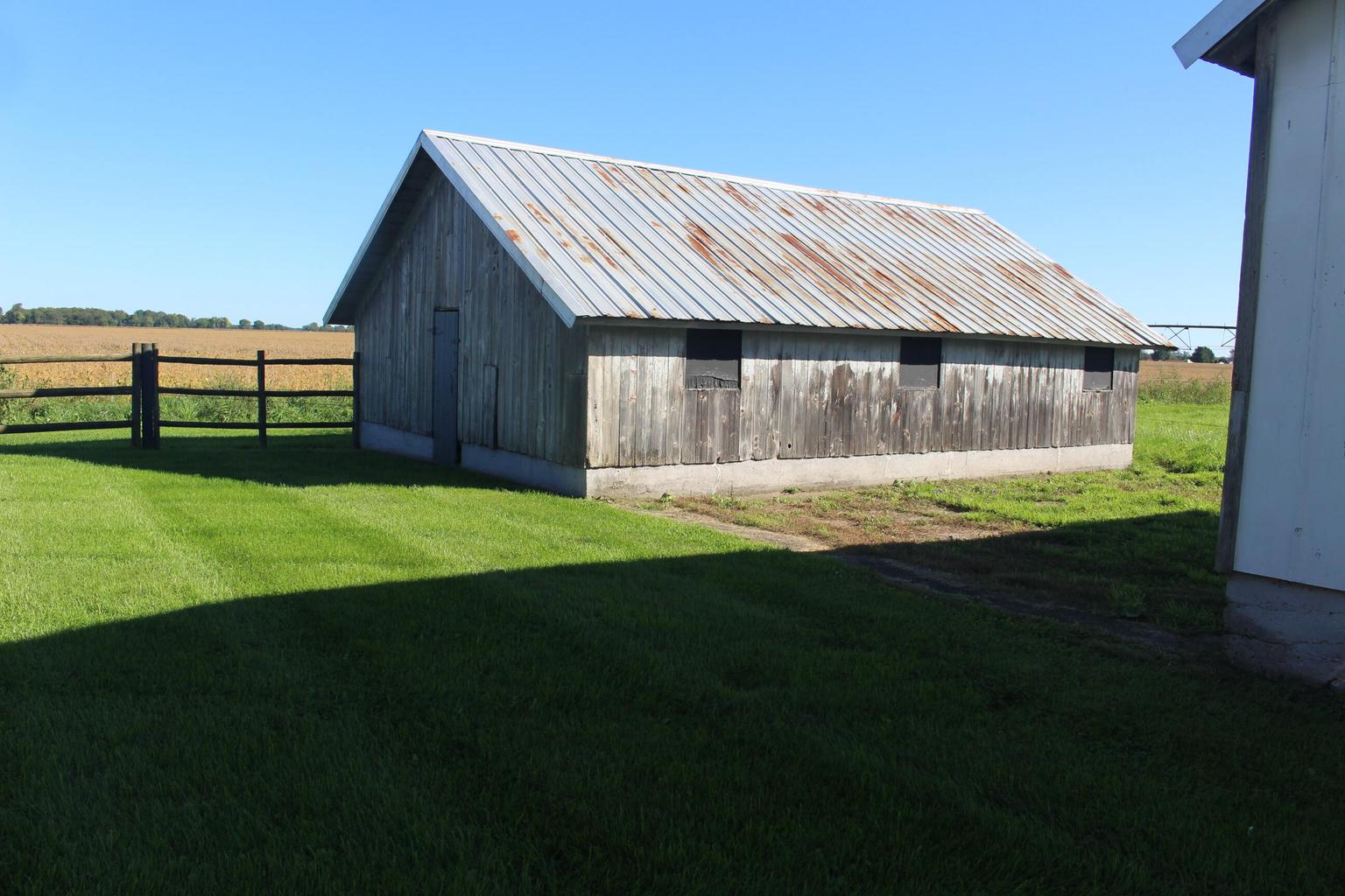 small barn with metal roof