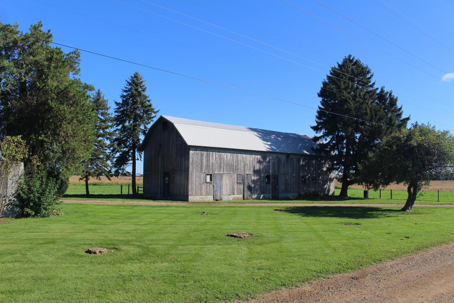 green lawn and large barn