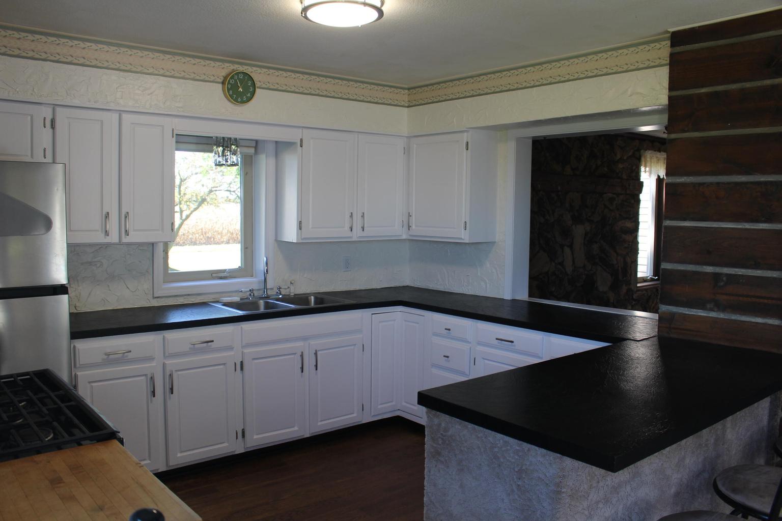 kitchen with white cabinets