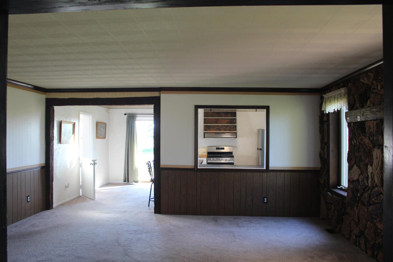 interior room with paneling